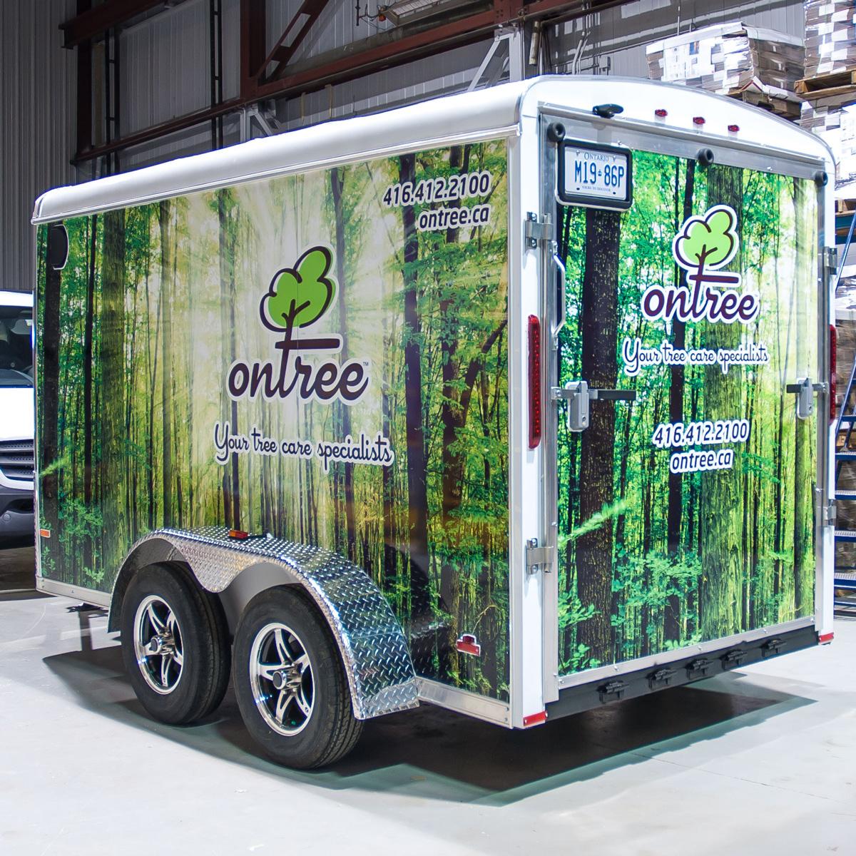 Vehicle vinyl wrap on trailer by TLA Graphics